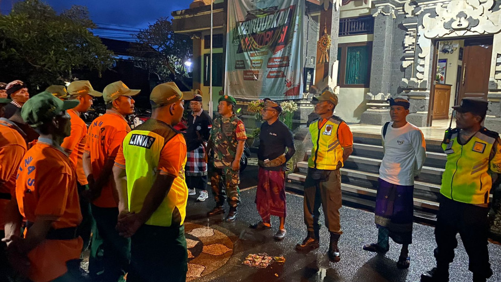 Pengamanan Malam Pengerupukan Nyepi Caka 1946 di Desa Baha